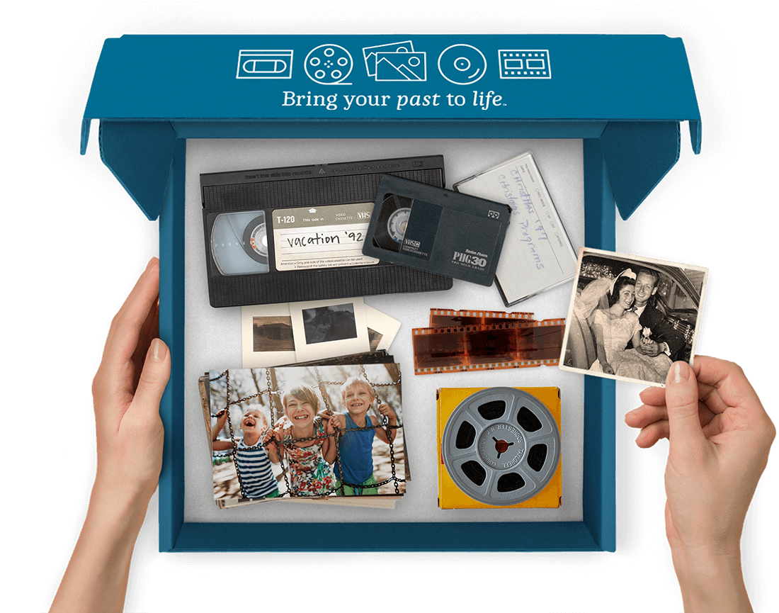 A FOREVER Box filled with tapes, photos, and slides